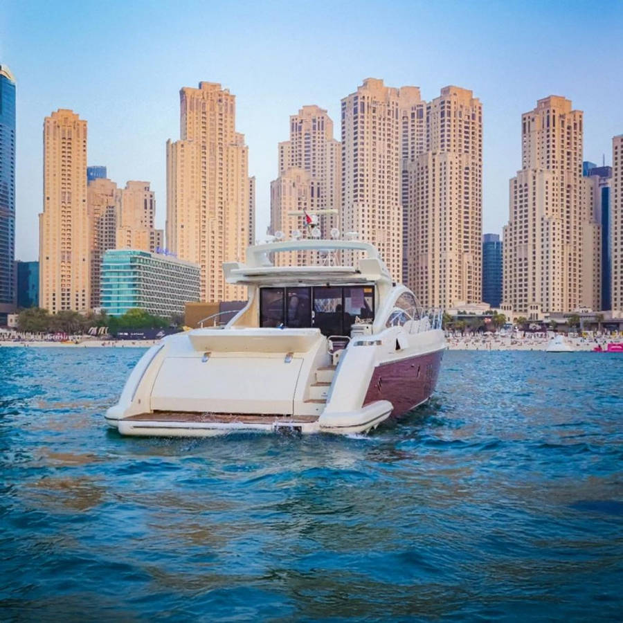 Luxury Sura 68ft yacht charter Dubai skyline view